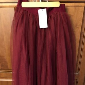 Women’s Lucy Wang wine colored tulle skirt.